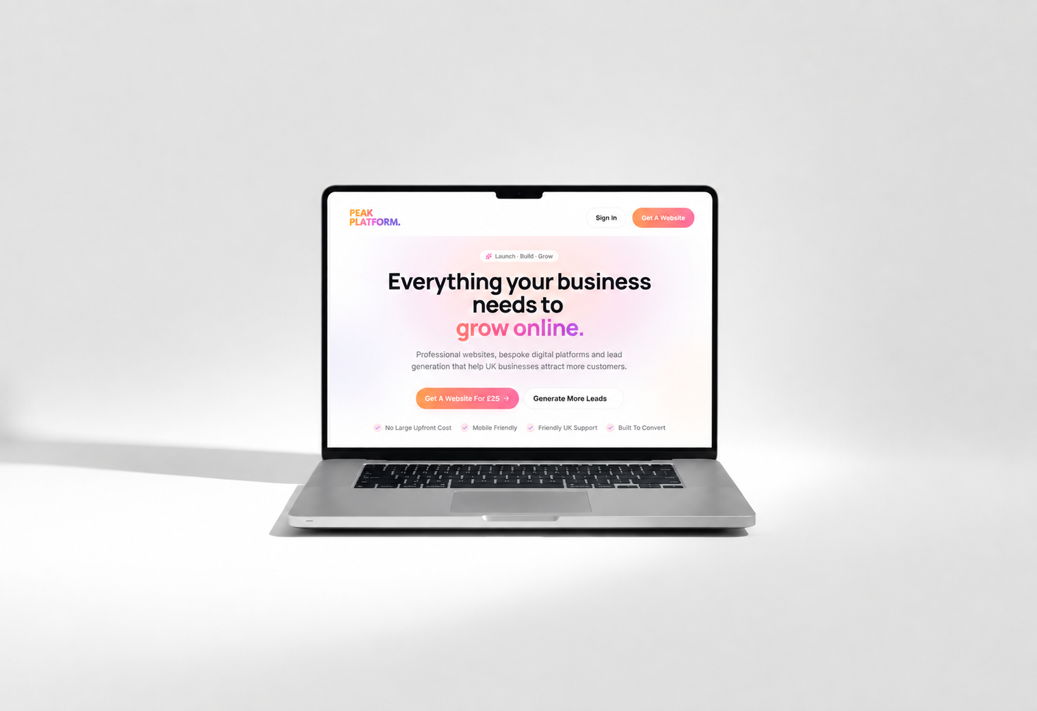 Peak Platform website shown on a MacBook